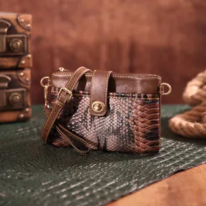 Detailed view of the western bohemian vintage snakeskin print crossbody bag