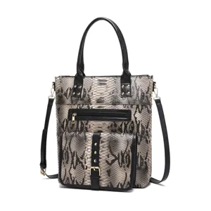 Vintage snakeskin pattern tote bag with gold-tone hardware and black straps.