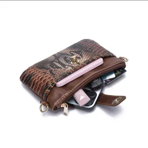Detailed interior view of a bohemian printed crossbody bag showing phone and card storage