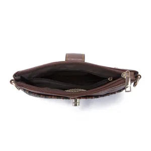 Interior view of vintage bohemian crossbody bag with zipper pocket and brown lining