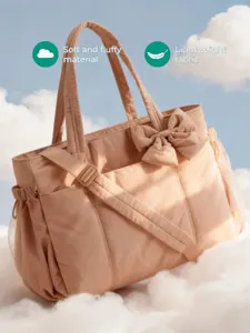 Borsa a tracolla trapuntata leggera e morbida con fiocco decorativo color rosa pesca