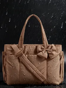 Borsa tote trapuntata marrone impermeabile con fiocco per viaggi e sport all'aperto.