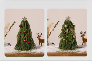 Two mini Norfolk pine Christmas trees with red and gold ornaments in a snowy scene
