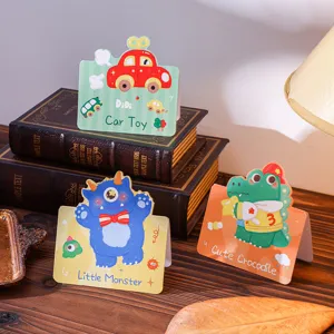 Detail of cartoon animal greeting cards with hand-drawn car and monster illustrations