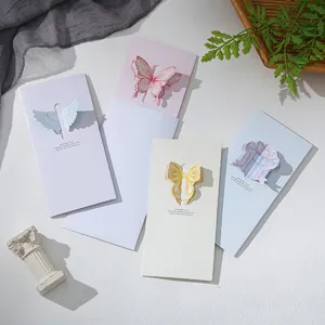 Beautiful selection of 3D pop-up greeting cards with butterfly, bow, and wing designs.