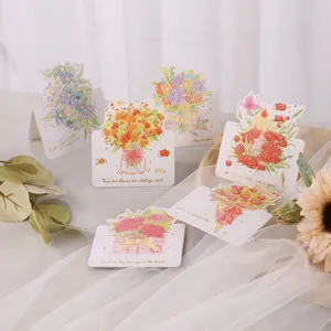 Vue détaillée de six cartes de vœux florales avec des accents de dorure à l'or