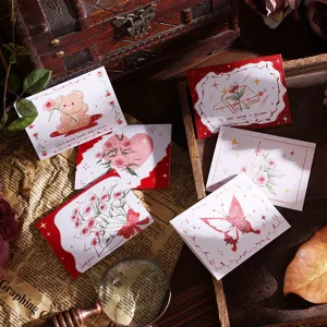 Detailed view of vintage-style romantic floral and heart-shaped greeting cards.