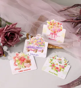 Close-up of four colorful cartoon flower greeting cards with sweet English messages.