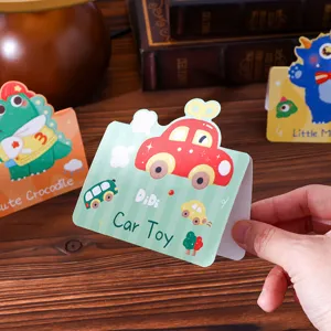 Hand holding a cute green cartoon car illustration greeting card with 3D effect details