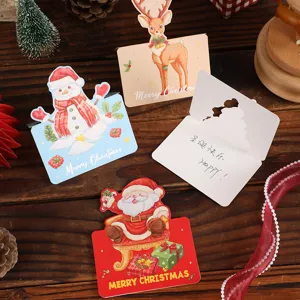 Vintage Christmas greeting cards featuring Santa Claus, Reindeer and Snowman gift tags.