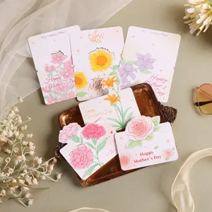 Detailed view of various floral Mother's Day greeting cards arranged on a vintage tray.