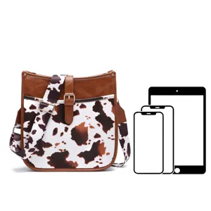 Vintage Western cow print crossbody bag shown with device icons to indicate size.