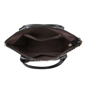 Interior detail of vintage snakeskin tote bag with brown lining and secure zipper pocket