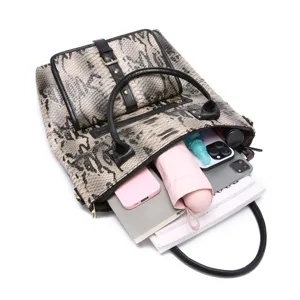 Large capacity vintage snakeskin tote bag showing interior storage and organization