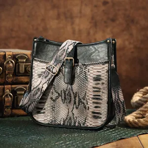 Vintage Bohemian crossbody bag with exotic snake print and black leather accents