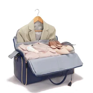 Bolsa de viaje grande de cuero PU azul con interior espacioso y compartimento para trajes.