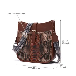 Vintage bohemian shoulder bag with faux python print showing size and strap dimensions