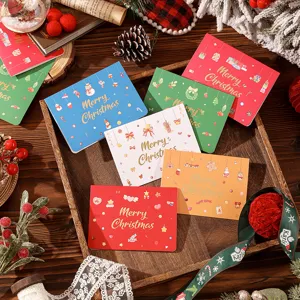 High-quality detail of colorful Christmas greeting cards with gold foil Merry Christmas