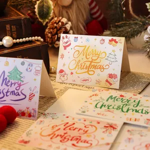 Detailed view of colorful Christmas cards with festive cartoon illustrations and greetings