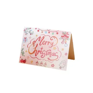 Festive Christmas greeting card with Merry Christmas calligraphy and cartoon icons