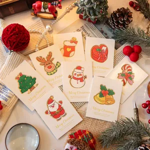 Variety of festive Christmas greeting cards with assorted holiday-themed illustrations