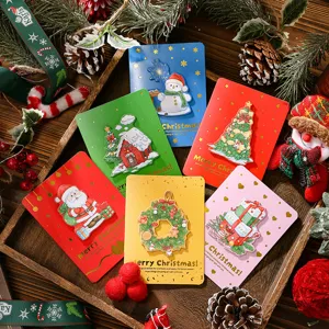 Macro view of six creative 3D Christmas greeting cards featuring gold foil stamping.