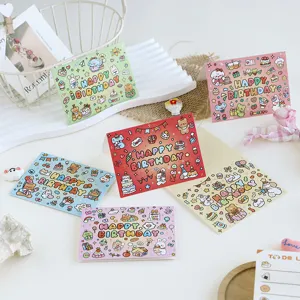 Detailed macro view of colorful cartoon birthday cards with cute animal illustrations