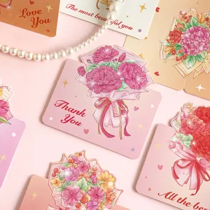 Detalle de tarjetas de felicitación con ramos de flores coloridos y texto "Thank You".