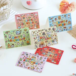 Close-up of six colorful cartoon birthday cards with cute animal illustrations