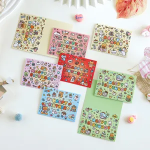 Detailed view of colorful cartoon birthday greeting cards with cute animal patterns