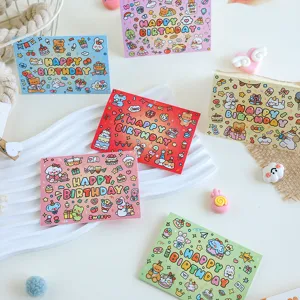 Detailed view of colorful cartoon birthday cards with cute animal illustrations