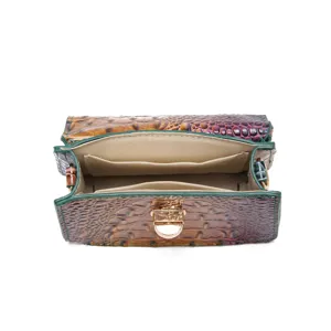 Detailed top-down view of multi-color crocodile embossed bag showing tan interior