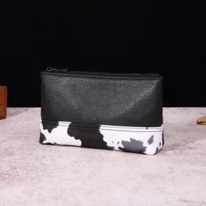 Neceser de maquillaje retro bohemio en cuero con estampado de vaca y cremallera