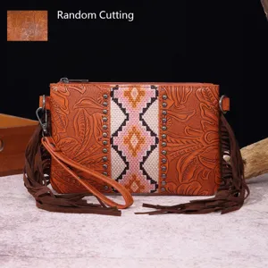 Bolso de mano vintage de estilo bohemio occidental en cuero con flecos largos