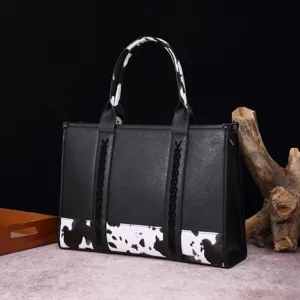 Bolso de mano retro de cuero negro estilo western con estampado de vaca y trenzados