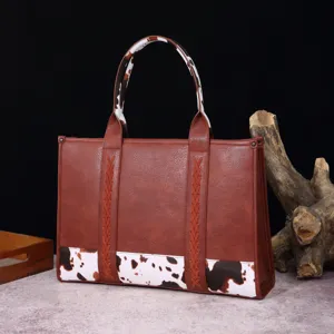 Bolso tote vintage de cuero sintético con estampado de vaca y detalles trenzados