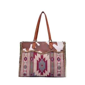 Large vintage Bohemian canvas tote bag with cow print panel and fringe detailing