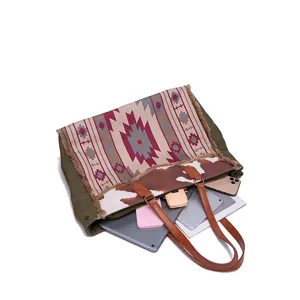 Large bohemian ethnic canvas tote bag showing interior storage capacity for devices.