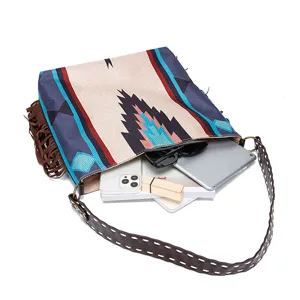 Bohemian woven cotton-linen tote bag with fringe showing large internal capacity