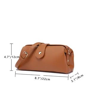 Bolso médico retro de cuero PU marrón con dimensiones 22x12x8cm sobre fondo blanco