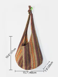 Bolso de hombro con estampado azteca y dimensiones del producto marcadas en pulgadas y cm