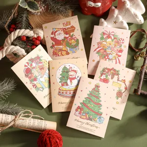 Gros plan de cartes de vœux de Noël à l'aquarelle avec texte doré Merry Christmas