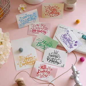 Detail of various colorful Happy Birthday cards with artistic hand-drawn doodles