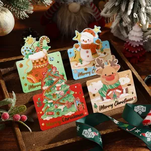 Detailansicht von Weihnachts-Grußkarten mit edler Goldprägung und festlichen Motiven