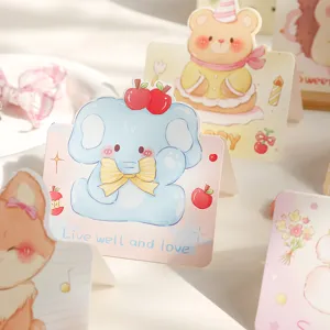 Macro detail of cute cartoon elephant greeting card with Live well and love printed text