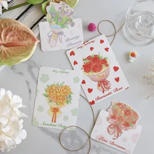 Detailed macro view of hand-painted flower bouquet greeting cards for Mother's Day gifts.