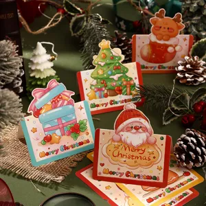 Assorted cartoon Christmas greeting cards featuring Santa, reindeer and tree motifs.