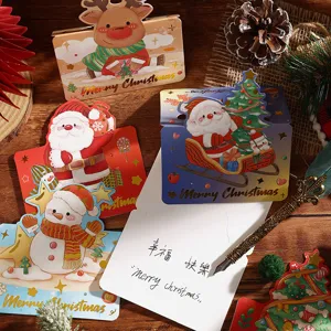 Detailansicht festlicher Weihnachtskarten mit Goldprägung und weihnachtlichen Motiven