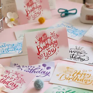 Detail of artistic Happy Birthday greeting cards with colorful doodle designs