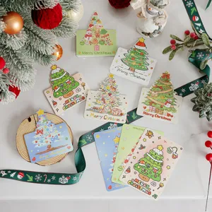 Assorted cartoon Christmas greeting cards featuring colorful tree designs and holiday props